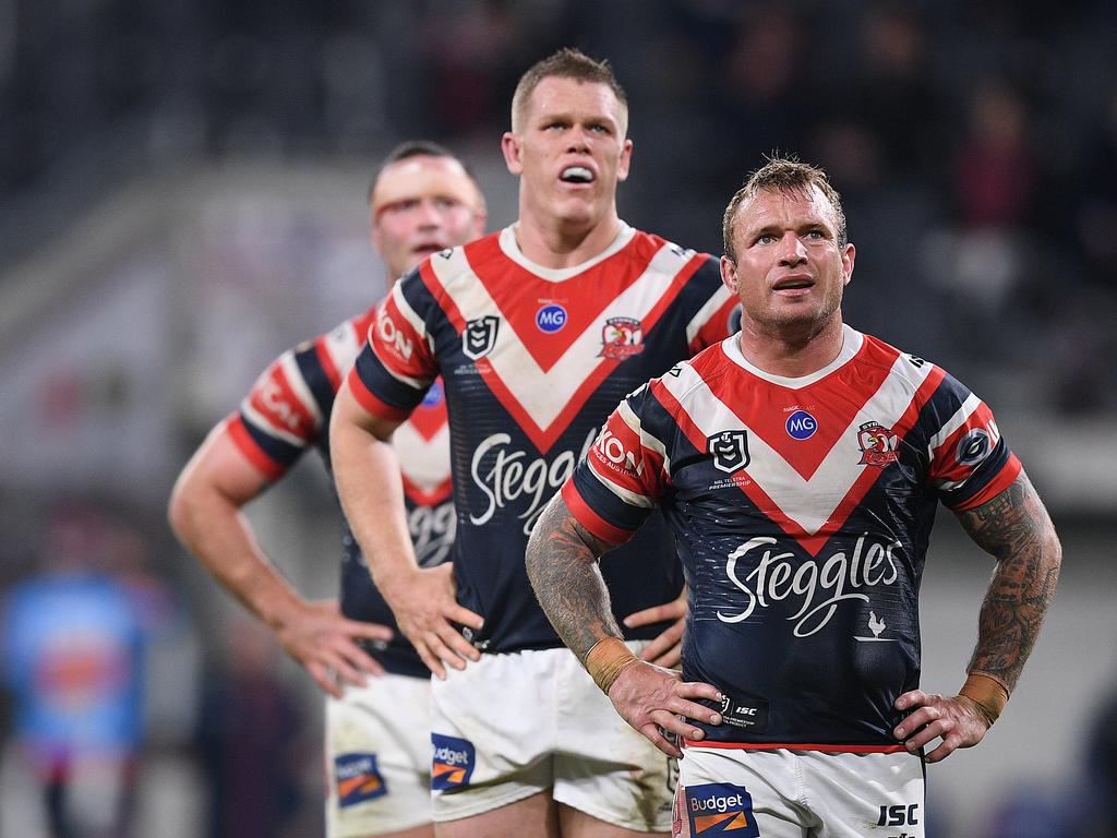 Jake Friend with fellow Roosters Lindsay Collins and Boyd Cordner.