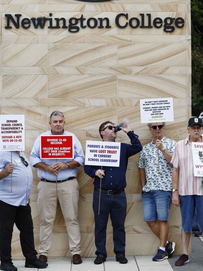 Former students and parents of Newington College held a silent protest against the school’s move to co-ed. Picture: Richard Dobson