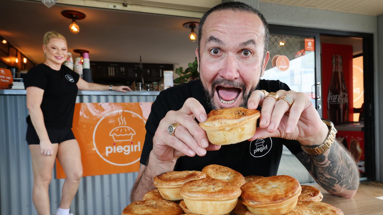 Pie Girl Helensvale will be holding their first ever pie eating competition on October 26. Owner Amy Grotegoed gets her husband Danny Grotegoed into training. Picture: Glenn Hampson