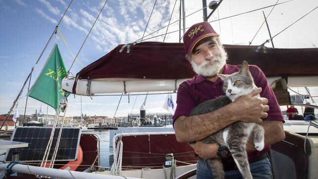Sylph VI, Robert Williams, with shipmate, Oli the cat. Sylph is the final yacht to complete the Sydney to Hobart 2023. Picture: Chris Kidd