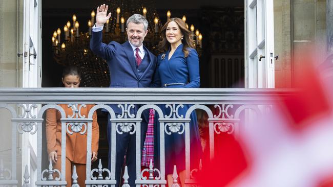 The pair embraced as they waved to onlookers. Picture: Martin Sylvest Andersen/Getty Images)