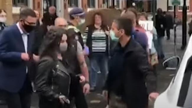 Daniel Andrews is mobbed by protesters as he leaves a function in Bendigo.