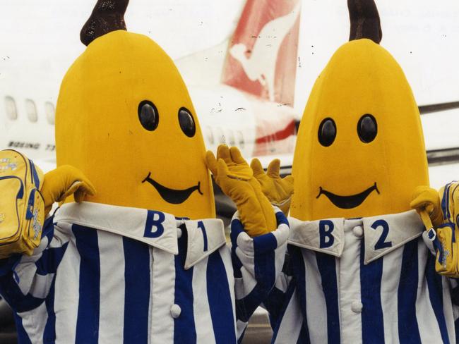 Fictional characters B1 and B2 from ABC children's TV program "Bananas in Pyjamas" arriving at Adelaide Airport aboard a Qantas aeroplane. Used "The Advertiser" 08 May 1996.