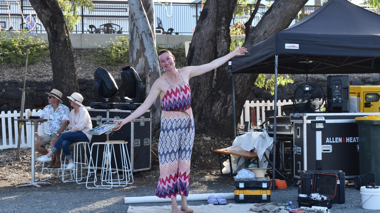 Laura Crane Creative doing a live painting at Rockhampton River Festival.