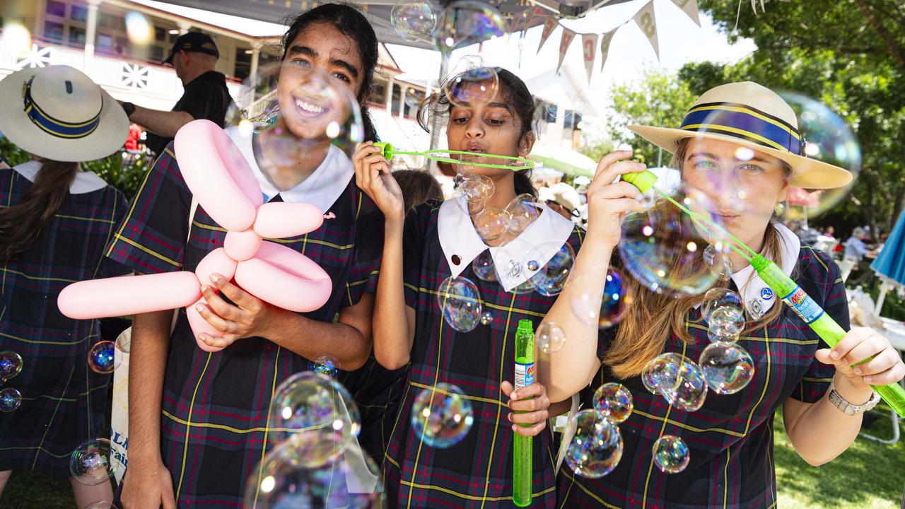 Having fun with bubbles are (from left) Sandilmi Kalubowila, Senudi Sesathpura and Monique Hitchcock at the Fairholme Spring Fair, Saturday, October 19, 2024. Picture: Kevin Farmer