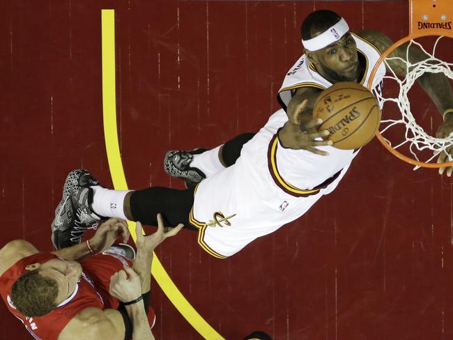 LeBron James dunks on Clippers’ enforcer Blake Griffin.