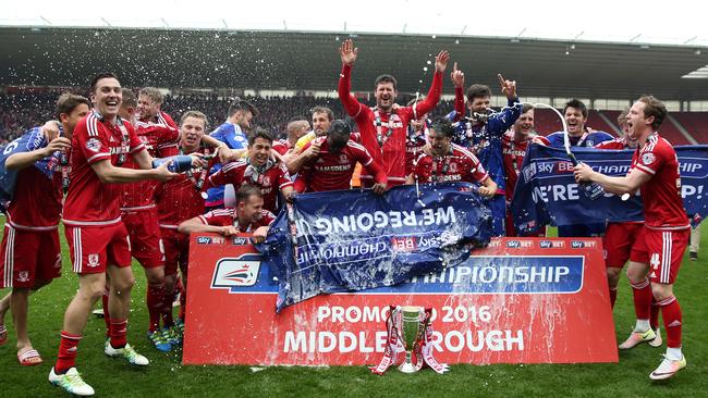 Middlesbrough players celebrate their promotion to the Premier League.