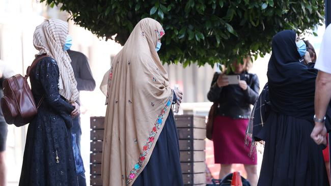 Evacuees from Afghanistan depart the Hotel Grand Chancellor in Adelaide after completing their 14-day quarantine. Picture: NCA NewsWire / David Mariuz