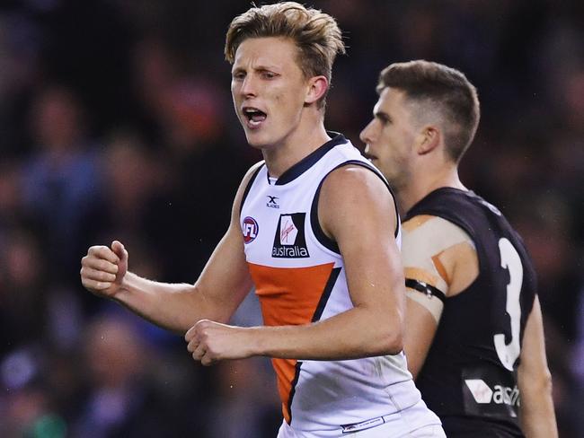 MELBOURNE, AUSTRALIA - JUNE 11: Lachie Whitfield of the Giants celebrates a goal during the round 12 AFL match between the Carlton Blues and the Greater Western Sydney Giants at Etihad Stadium on June 11, 2017 in Melbourne, Australia.  (Photo by Michael Dodge/Getty Images)