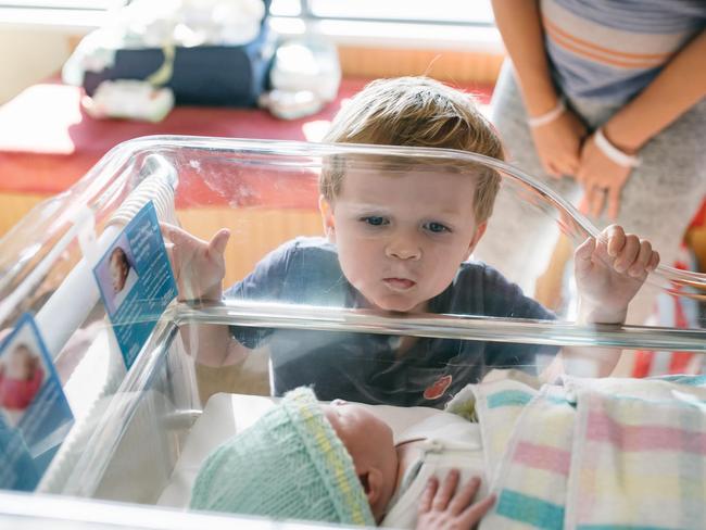 Mack Archbald meets the newest family member, little brother Nash. Picture: Stefanie Plum Photography