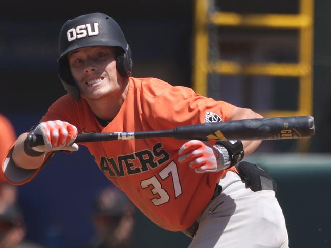 LOS ANGELES, CALIFORNIA - MAY 14: Travis Bazzana #37 of the Oregon State Beavers bunts during a game against the UCLA Bruins at Jackie Robinson Stadium on May 14, 2023 in Los Angeles, California. (Photo by Katharine Lotze/Getty Images)