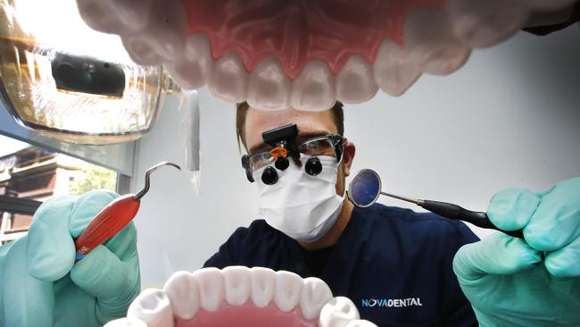 Private health insurance price rises on April 1 and dentist Dr David Kozor said Australians should check what cover they have. Picture: News Corp 