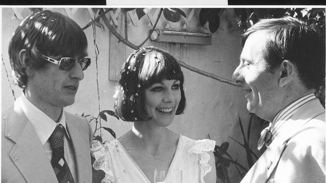 Ross Fitzgerald with wife Lyndal Moor and their friend, Barry Humphries, at their wedding in 1976. Picture: Supplied