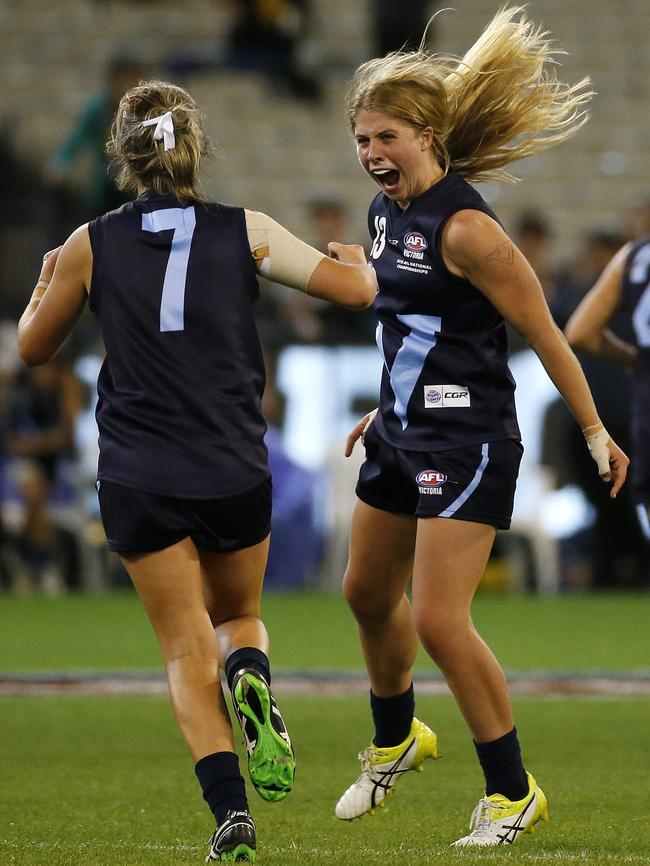 Vic Metro captain Katherine Smith celebrates winning the national championships grand final against Western Australia at the MCG. Picture: George Salpigtidis