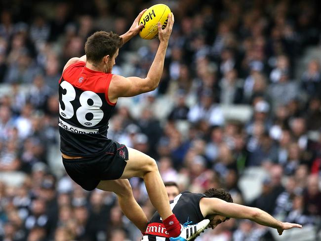 Jeremy Howe provided a rare highlight at the MCG, taking this spectacular mark over Alex Fasolo. Picture: Wayne Ludbey