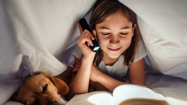 Reading a book in bed could actually make it more difficult to sleep at night. Picture: iStock