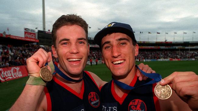 Roger James (right) with brother Brett James after their 1997 Norwood flag. Picture: SANFL