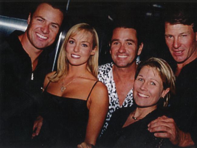 Darren Thornburgh (centre) with celebrities including Sam Newman at Carousel Nightclub in the 1990s.