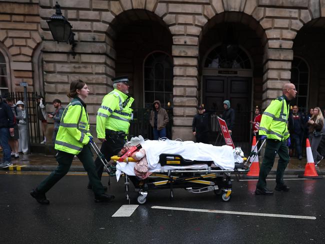 Emergency services at the scene after a car collided with pedestrians. Picture: Getty Images