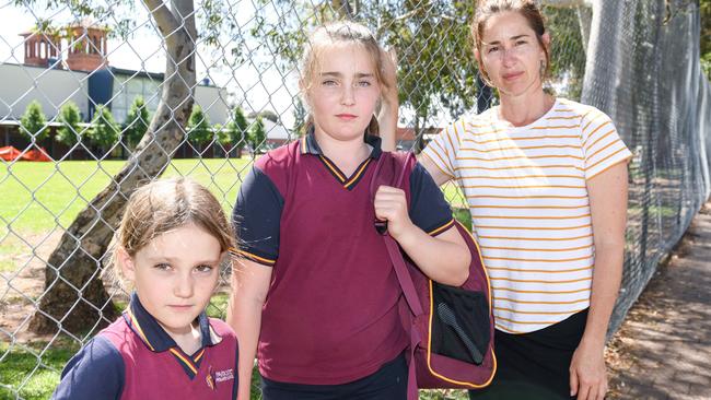 Cindy Groth and daughters Eva, 8, and Ruby, 11, at Parkside Primary School. Picture: Brenton Edwards