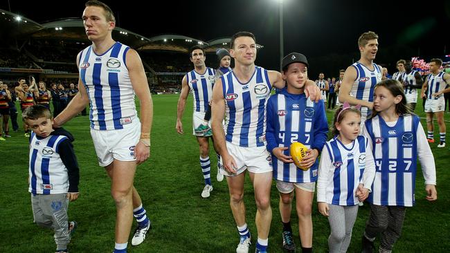 Drew Petrie, Michael Firrito, Brent Harvey and Nick Dal Santo walk off for the last time as North Melbourne players. Picture: Michael Klein