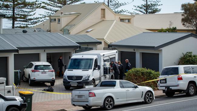 Police gathering evidence and dismantling the ice lab that was set up in an Airbnb on the Esplanade, Henley Beach. Picture: Matt Turner