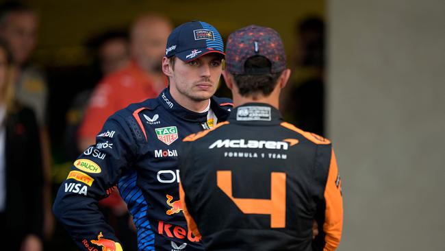 Red Bull Racing's Dutch driver Max Verstappen (L) talks with McLaren's British driver Lando Norris after the qualifying session of the Formula One Mexico City Grand Prix at the Hermanos Rodriguez racetrack, in Mexico City on October 26, 2024. (Photo by Alfredo ESTRELLA / AFP)