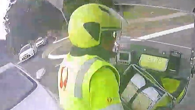 A still image of footage from a crash involving a sedan not giving way to a postie. Picture: Australia Post