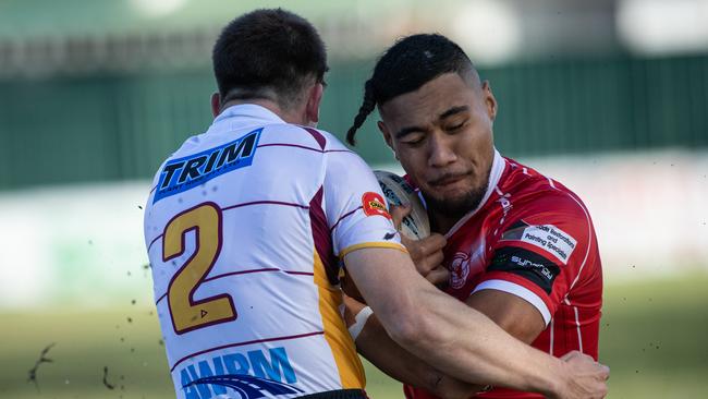 Eagles winger Jayke Lealuga Puhotau takes on his opposite, James Lee. Pics by Julian Andrews.