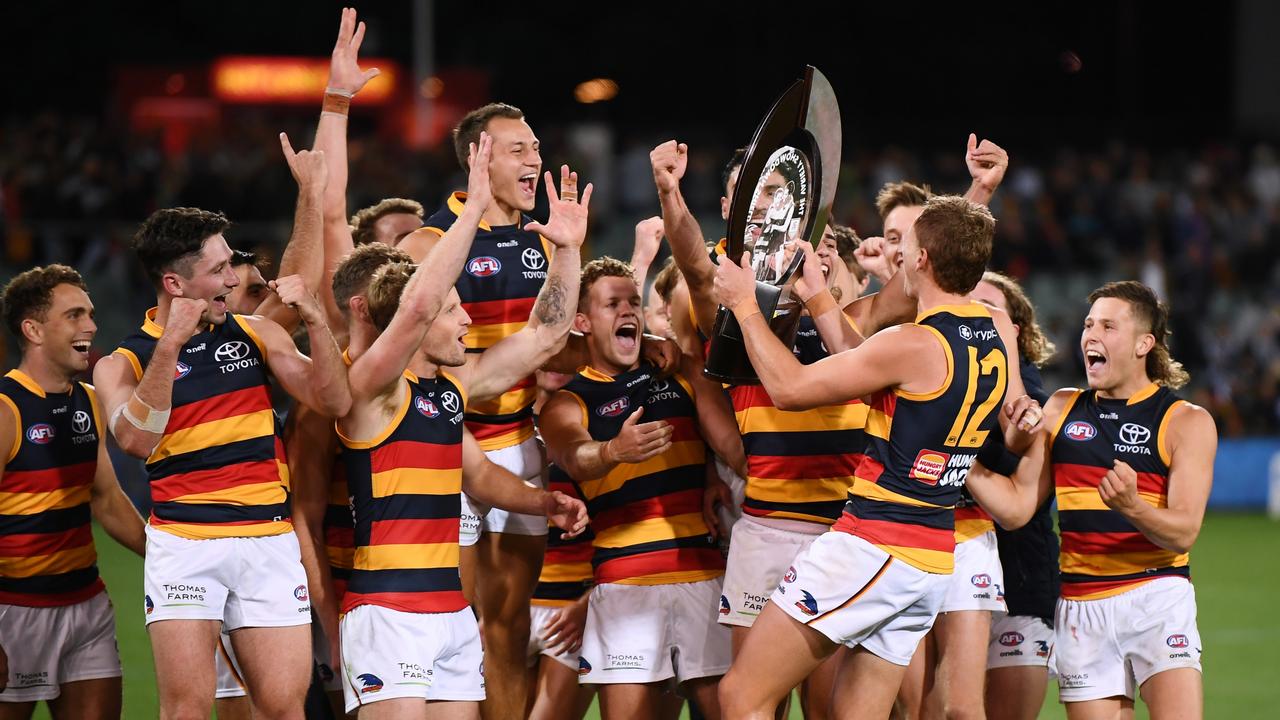 Adelaide players celebrate their Showdown win this year. Picture: Mark Brake/Getty Images