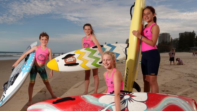 Southport Surf Life Saving Club is celebrating the 50th anniversary of its nipper program. Southport Nippers Ted Barrett, 11, Ruby Barrett, 12, Freya Brown, 10, and Brooke Malcolm, 10. Picture: Scott Fletcher