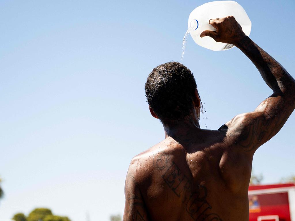 A person cools off amid searing heat in Phoenix, Arizona. Picture: Getty Images/AFP