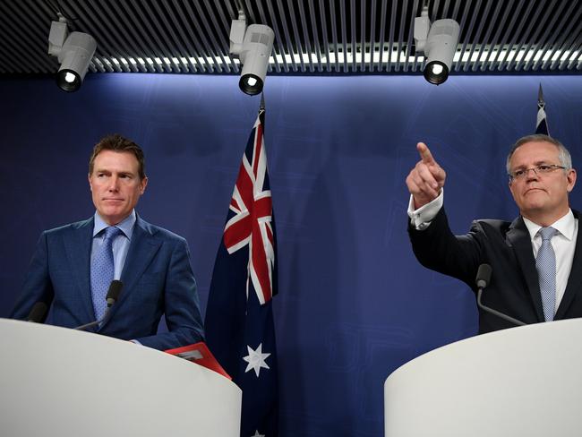 Prime Minister Scott Morrison and Attorney general Christian Porter (left) address media in Sydney, Thursday, December 13, 2018. The Prime Minister says Australia needs a dedicated new law that makes religious discrimination illegal, in order to protect freedom. (AAP Image/Dan Himbrechts) NO ARCHIVING