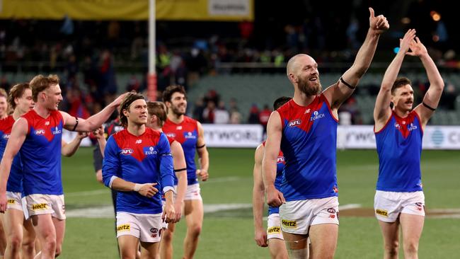 Max Gawn leads the Demons off Adelaide Oval after the convincing win. Picture: James Elsby/AFL Photos