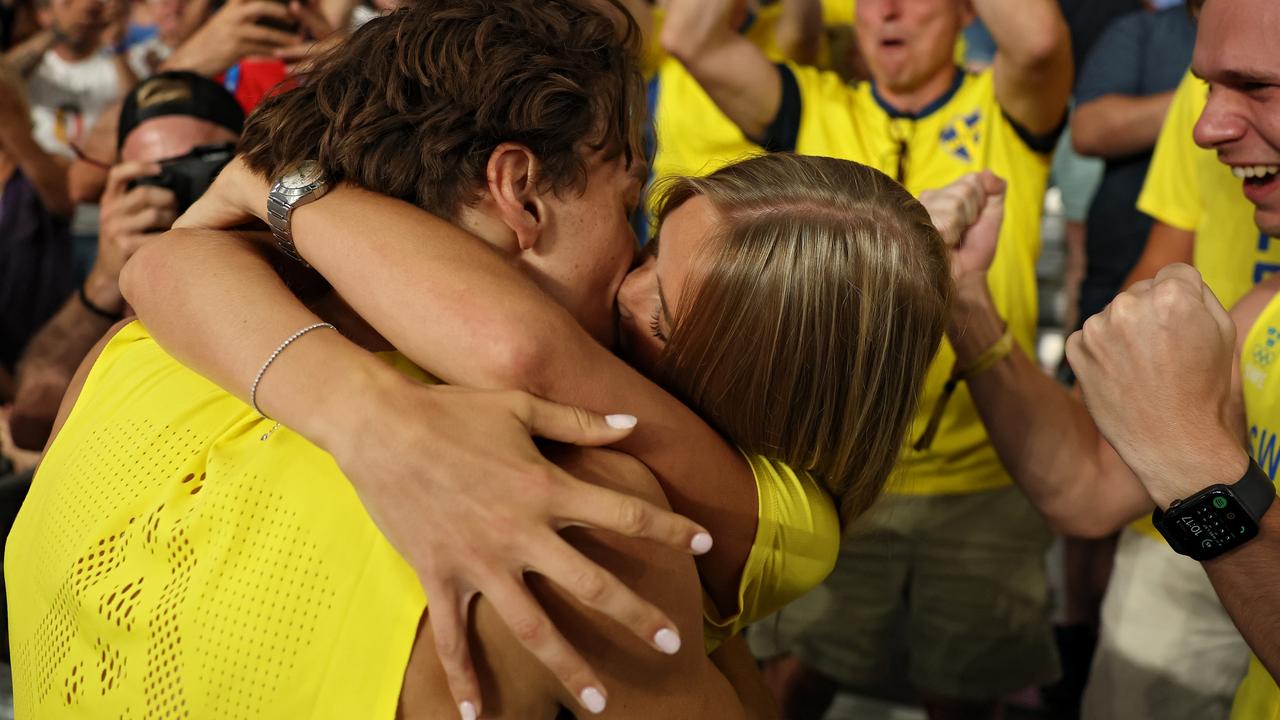 Gold medallist Armand Duplantis of Sweden celebrates by kissing his girlfriend Desire Inglander. Picture: Patrick Smith/Getty Images