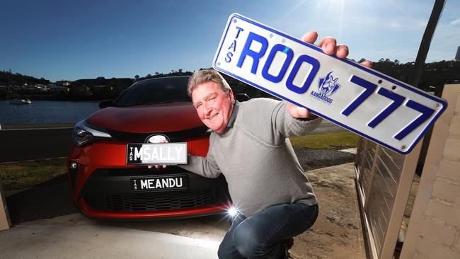 Russell Hanson of Lindisfarne with his personalised plates he is looking to sell. Picture: Zak Simmonds