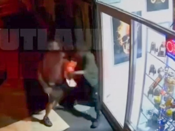 A tobacco store owner fights off another man. Picture: Outlaw Media