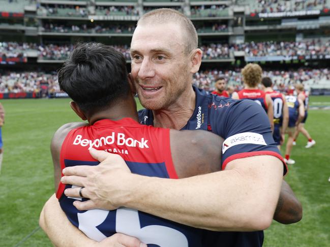 Simon Goodwin and Kysaiah Pickett. Picture: Michael Klein