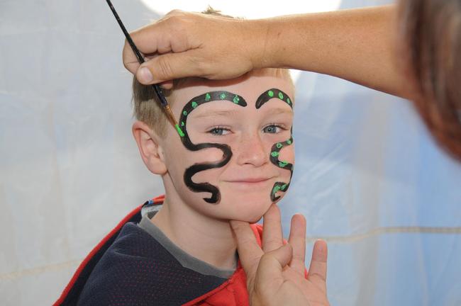 Reilley Bates gets his face painted. Picture: Craig Warhurst