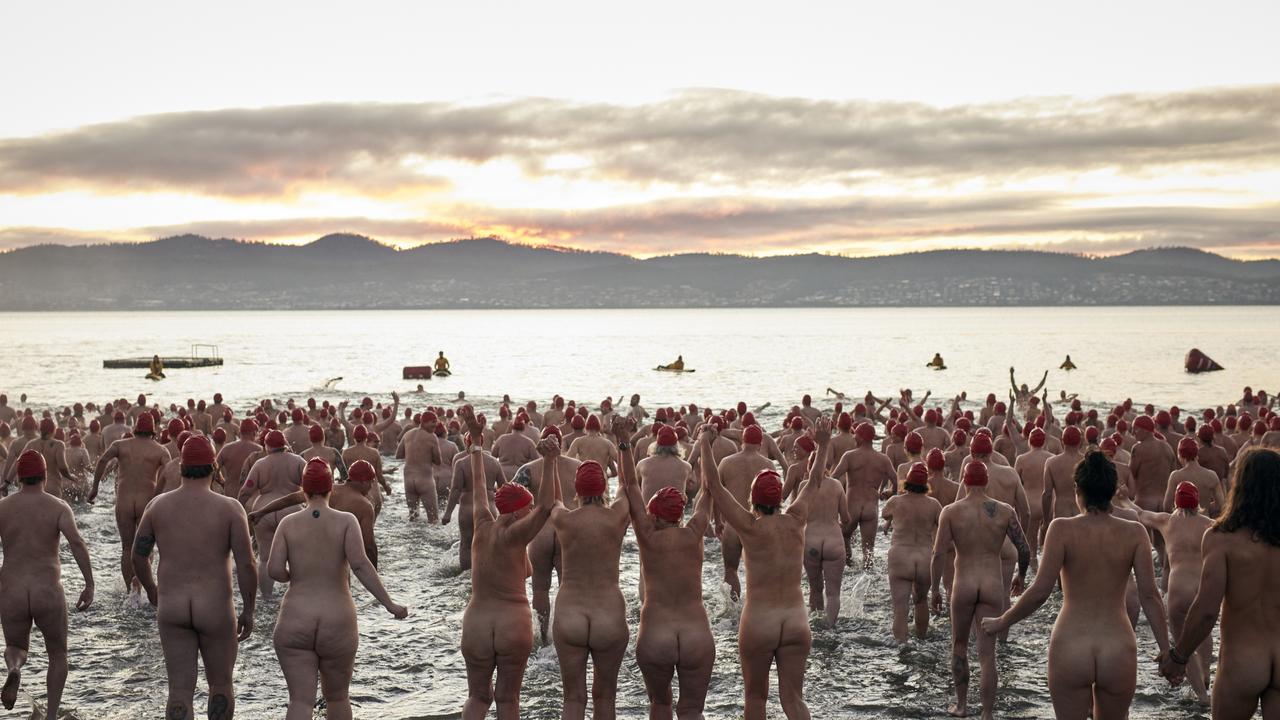 Participants begin the Nude Solstice Swim at Long Beach. Pic: Dark Mofo