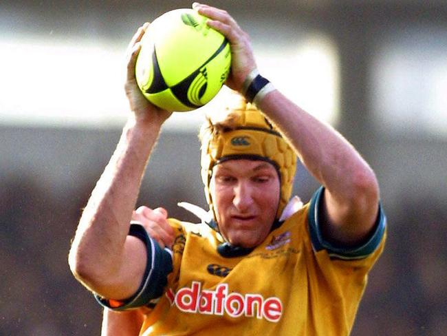 ##AFP PIC FEE PAYABLE CHECK BEFORE USE## Aust player Justin Harrison (top) with Norm Maxwell tackling.Rugby union - Australia Wallabies vs New Zealand All Blacks Tri-Nations match at Dunedin, NZ 11 Aug 2001.  a/ct/Rugby/International/matches