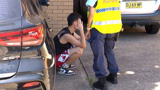 Another luxury car, a Lamborghini Huracan with the licence plate BURG3R, pulled over near the crash scene but is understood not to be involved. Credit: OnScene Bondi