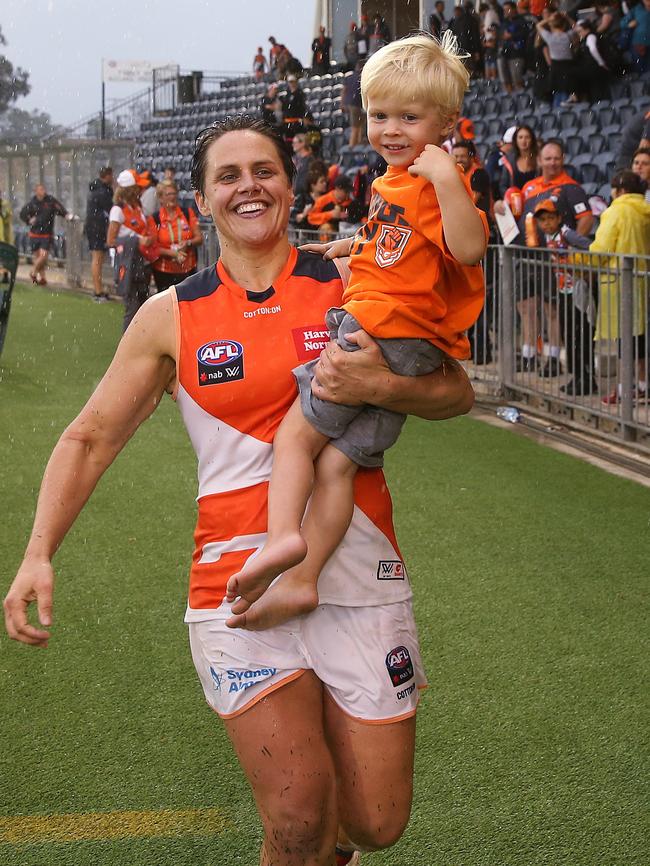 Courtney Gum with her son Buz after the GWS Giants match with Adelaide at Blacktown.                                                             Picture. Phil Hillyard