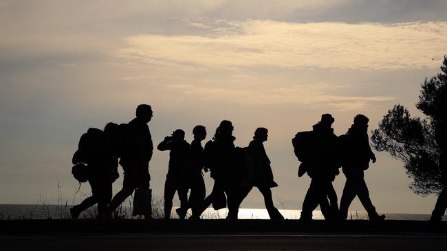 People walk the 3km from Mimosa to the site of dawn service to celebrate the 100th anniversary of the Anzac landing in Gallipoli.