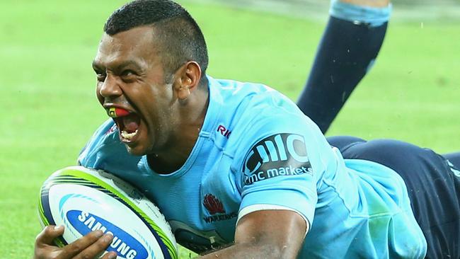 MELBOURNE, AUSTRALIA - FEBRUARY 20: Kurtley Beale of the Waratahs celebrates scoring a try during the round two Super Rugby match between the Rebels and the Waratahs at AAMI Park on February 20, 2015 in Melbourne, Australia. (Photo by Quinn Rooney/Getty Images)