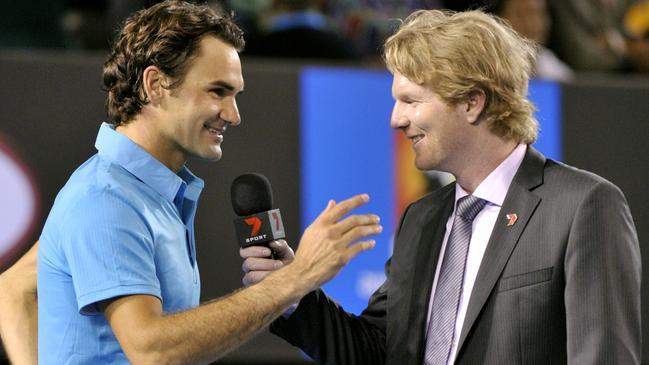 Roger Federer being interviewed by Courier after beating Jo-Wilfried Tsonga at the Aus Open in 2010. Picture: AP