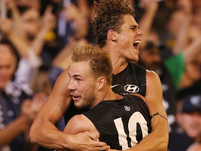 AFL Round1. Carlton vs Richmond at the MCG.   Charlie Curnow of the Blues celebrates a 3rd qtr goal with Harry McKay   . Pic: Michael Klein