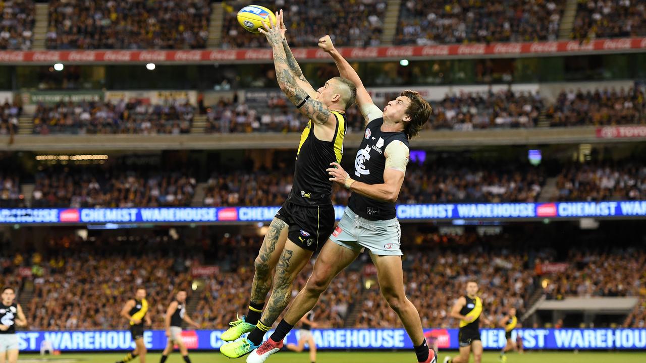 Dustin Martin flies for a mark in front a packed MCG crowd during last year’s season opener.