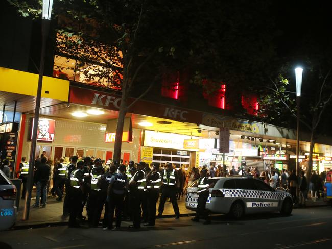 Police and crowd in Swanston St during the Moomba riots. Picture: Yuri Koluzmin