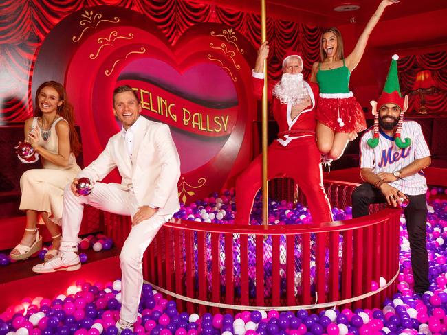 MELBOURNE, DECEMBER 13, 2023: What to do and what NOT to do at the office Christmas party. Well dressed couple in white - Stephen Wools, Gracie Ireland, how not to dress couple - Vasu Sondhi, Denika Vitharana, bad Santa - Josh Lefers. Picture: Mark Stewart